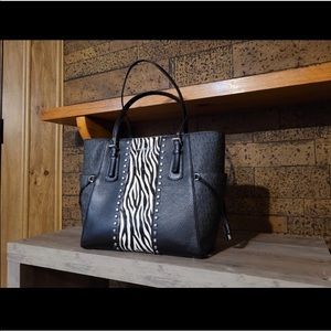 Black and zebra voyager Michael kors tote